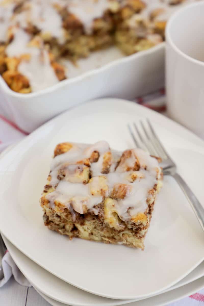 Cinnamon Roll Breakfast Casserole on stacked white plates