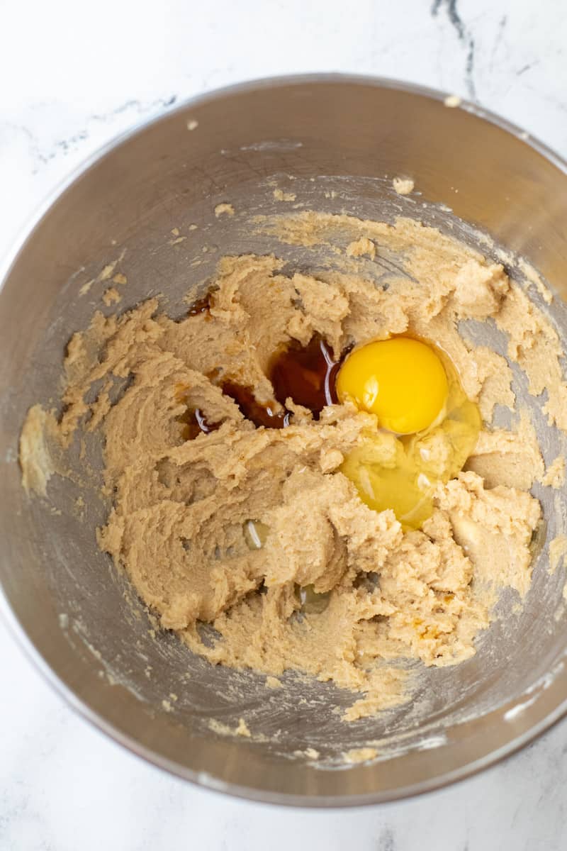 adding in vanilla and egg to the dough
