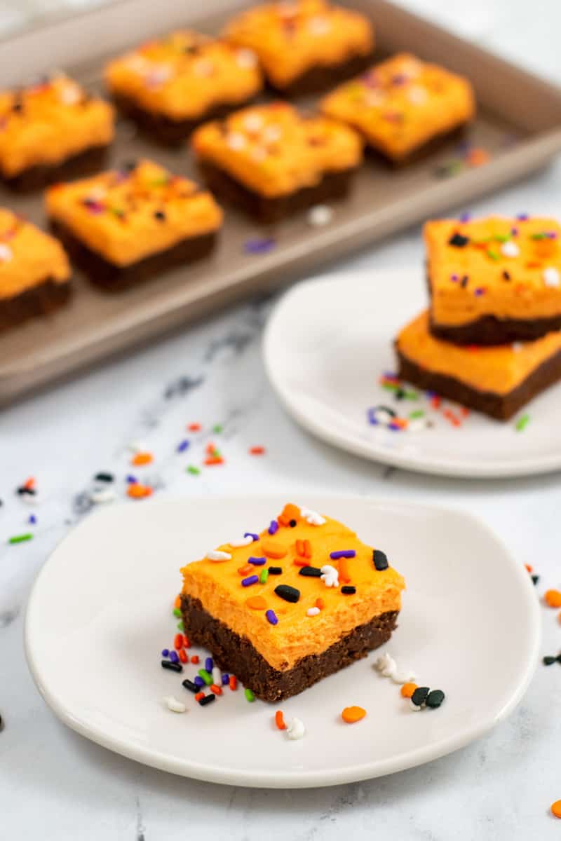 Halloween cookie bars on a white plate