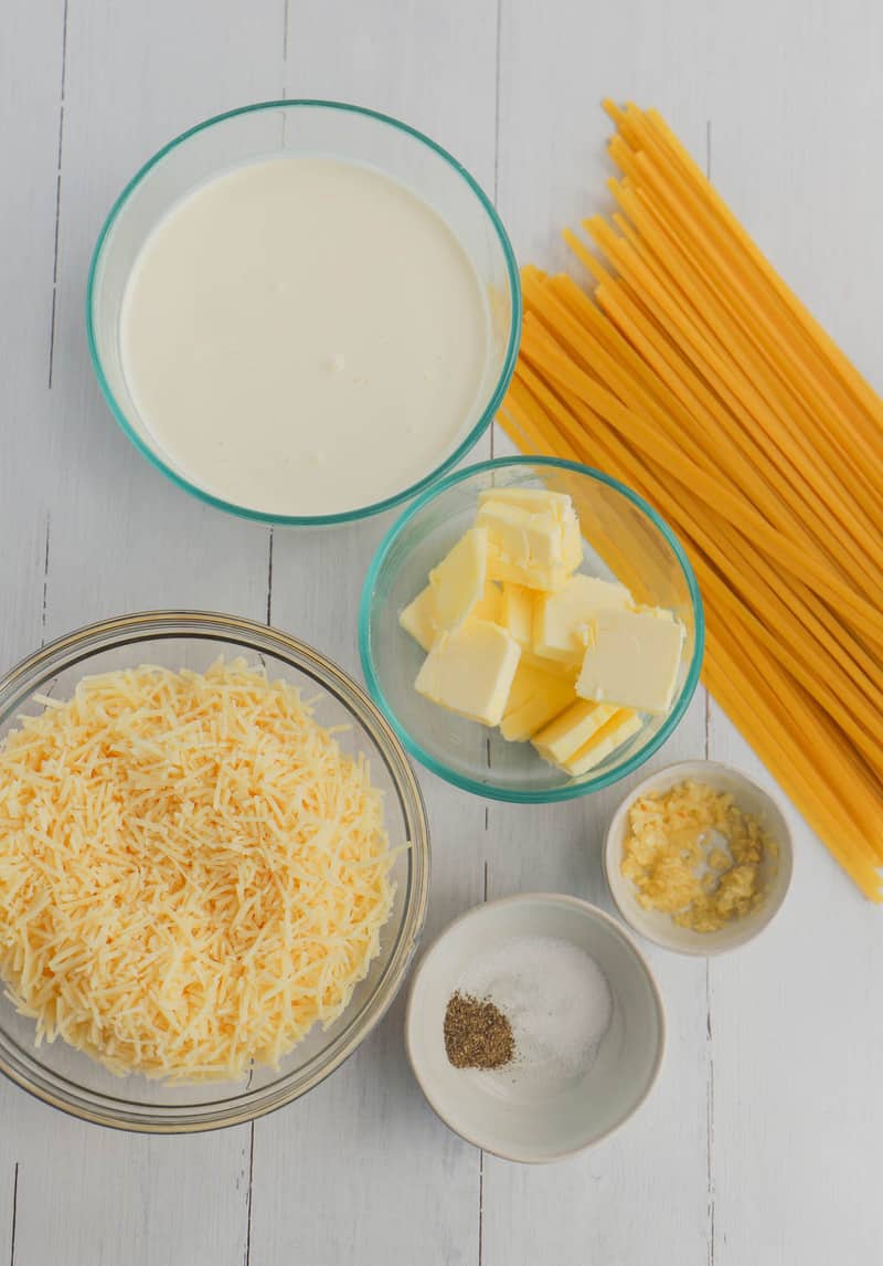 ingredients for alfredo sauce with noodles.