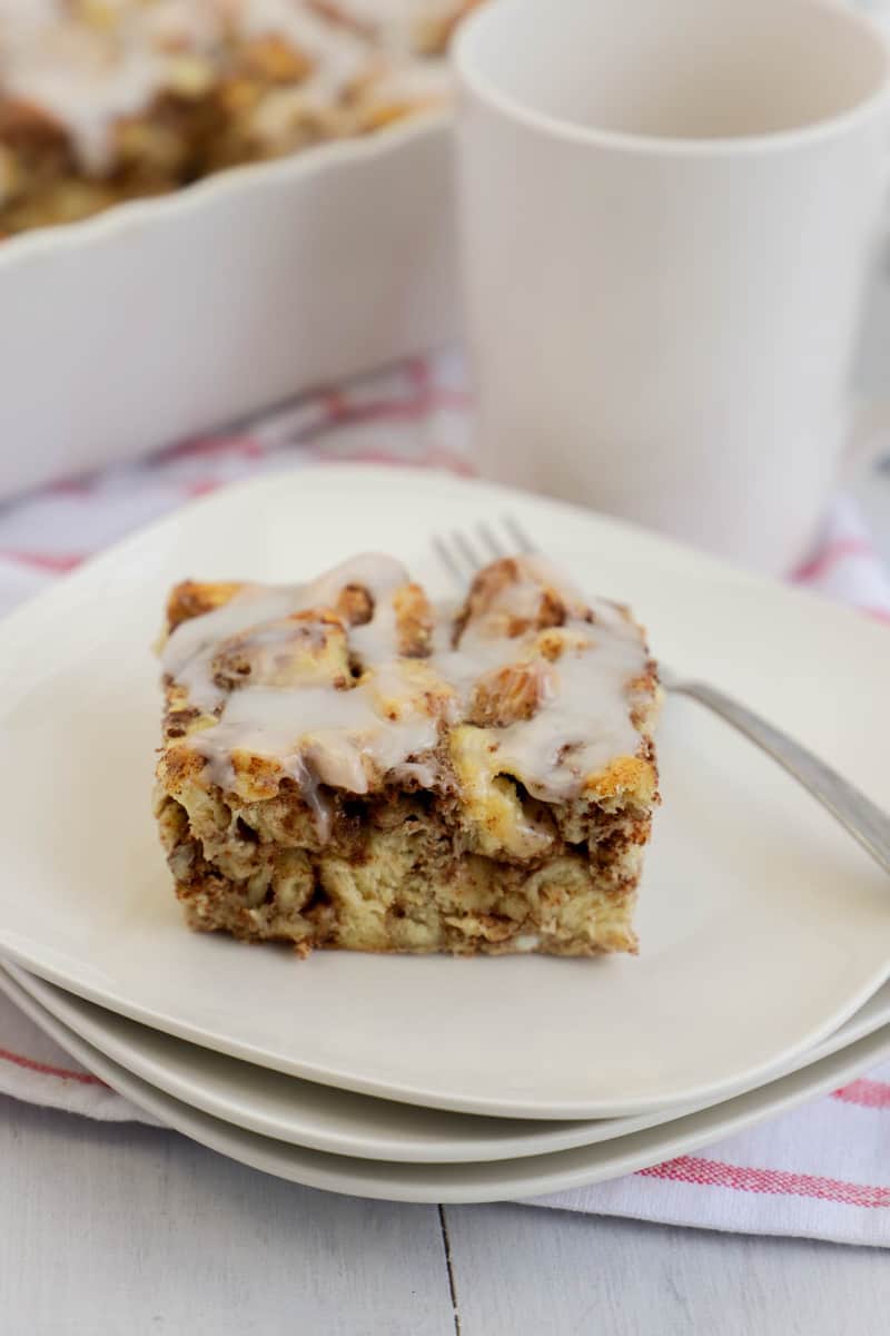 cinnamon roll casserole on stacked plates