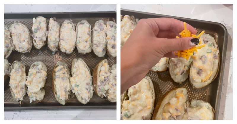 placing filled potatoes on a baking tray and topping with cheese