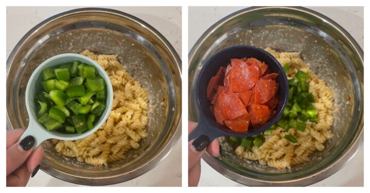 mixing in green peppers and pepperoni to the pasta salad