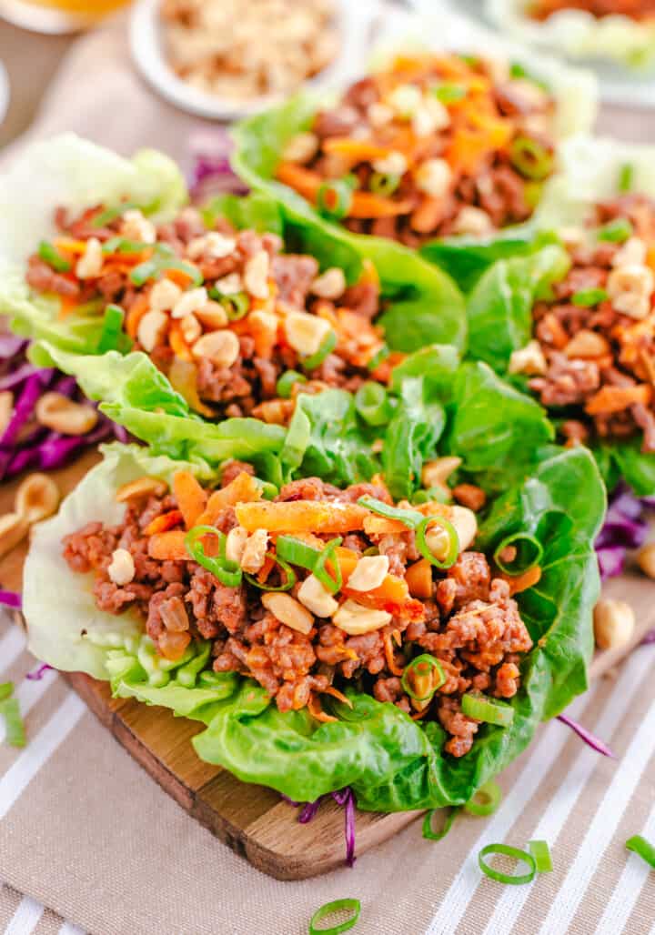 ground beef lettuce wraps on a wooden board