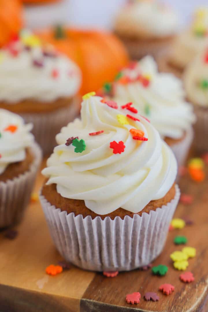 Pumpkin Cupcakes on wooden serving board