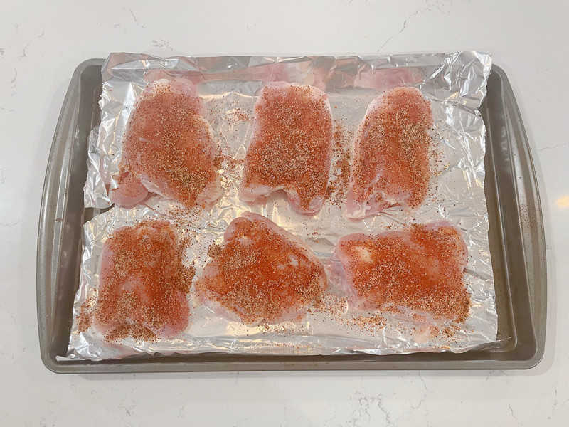chicken thighs rubbed with BBQ dry rub