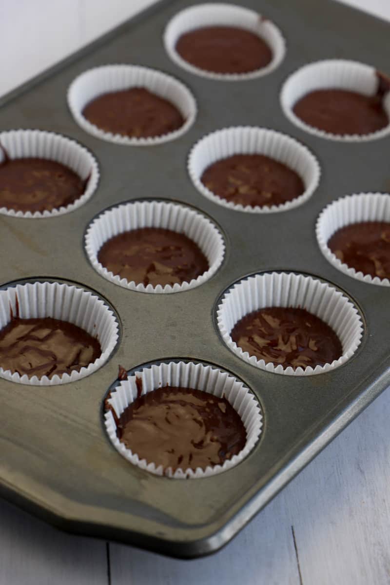 filling your cupcake liners with the batter