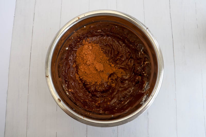 mixing ingredients for chocolate buttercream icing