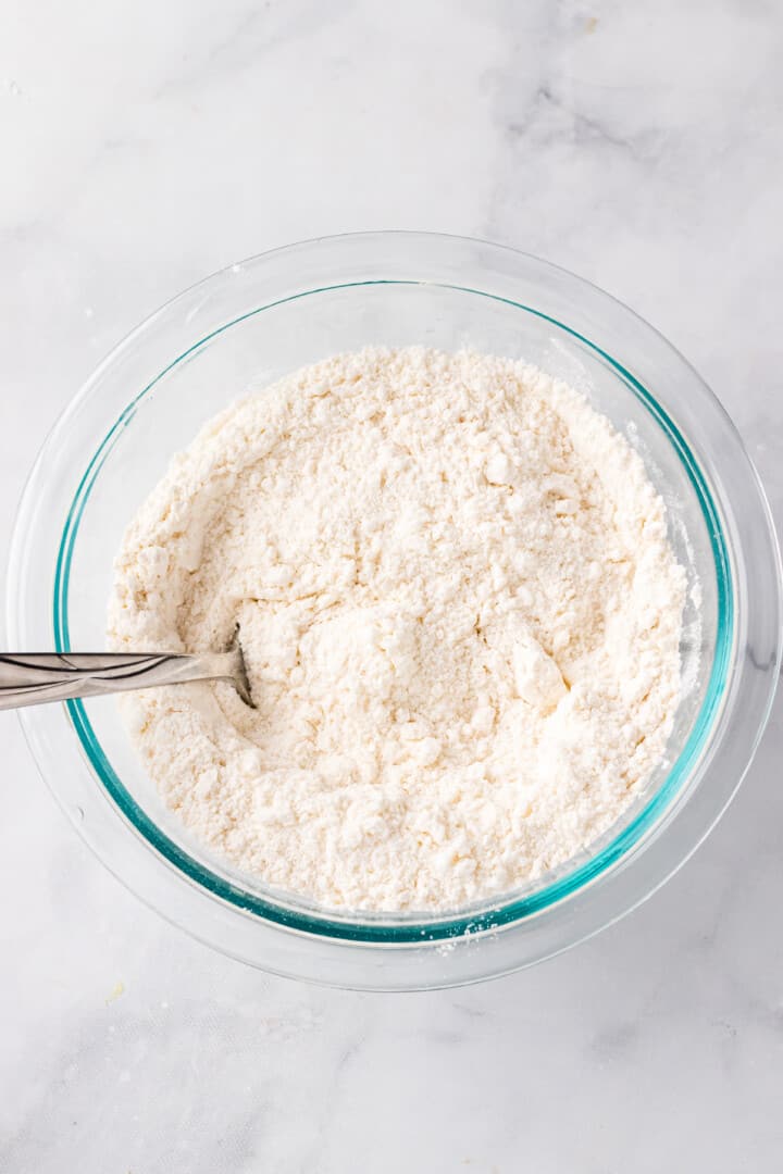 mixing together the dry ingredients for the cookies