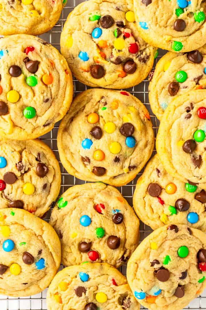 close up of m&m cookies on wire rack