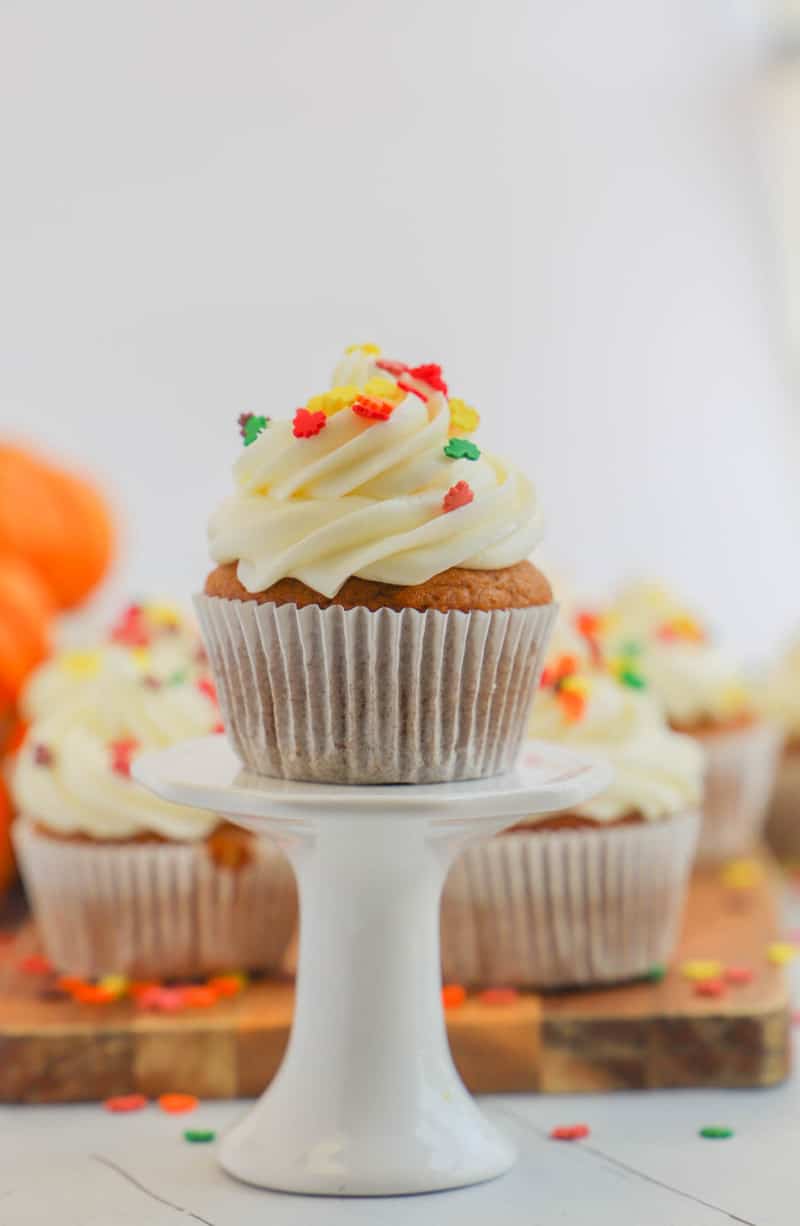 pumpkin cupcake on white stand