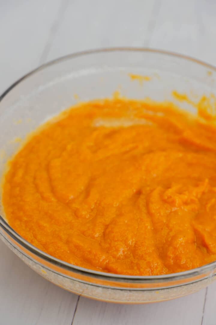 pumpkin puree in a clear bowl.