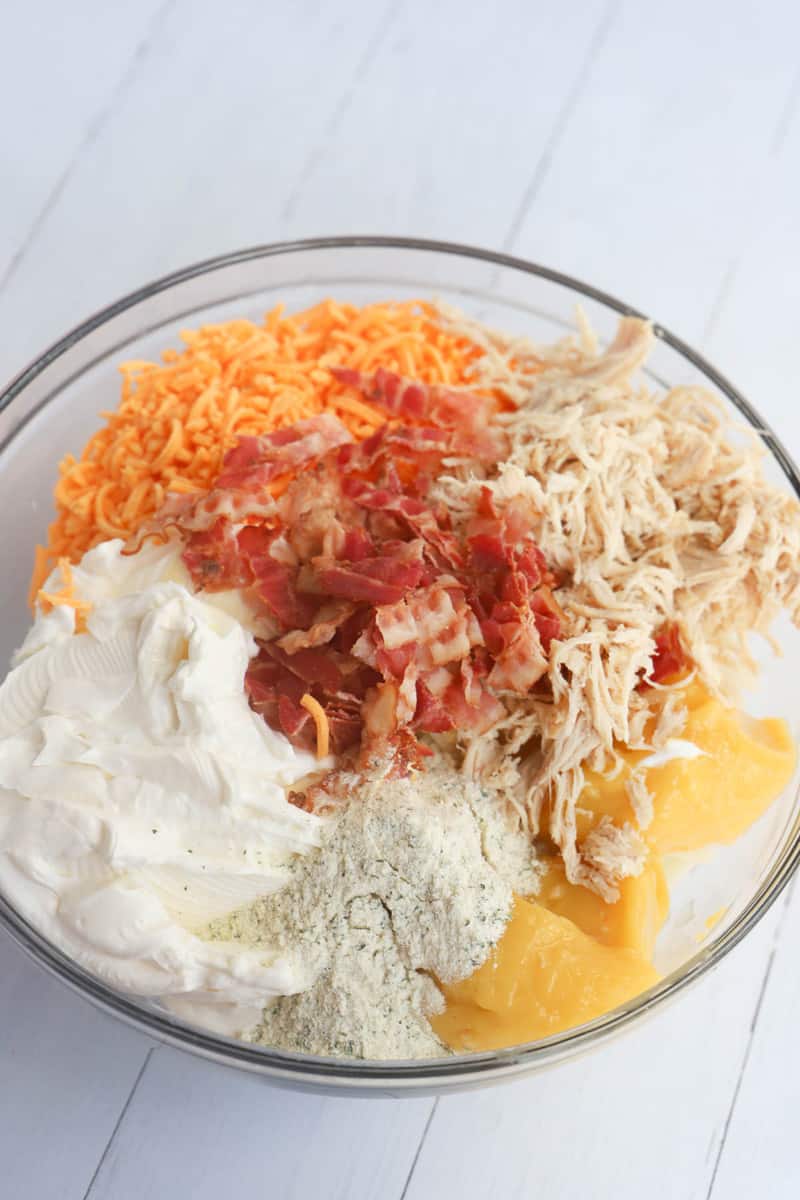 mixing together all ingredients for the casserole