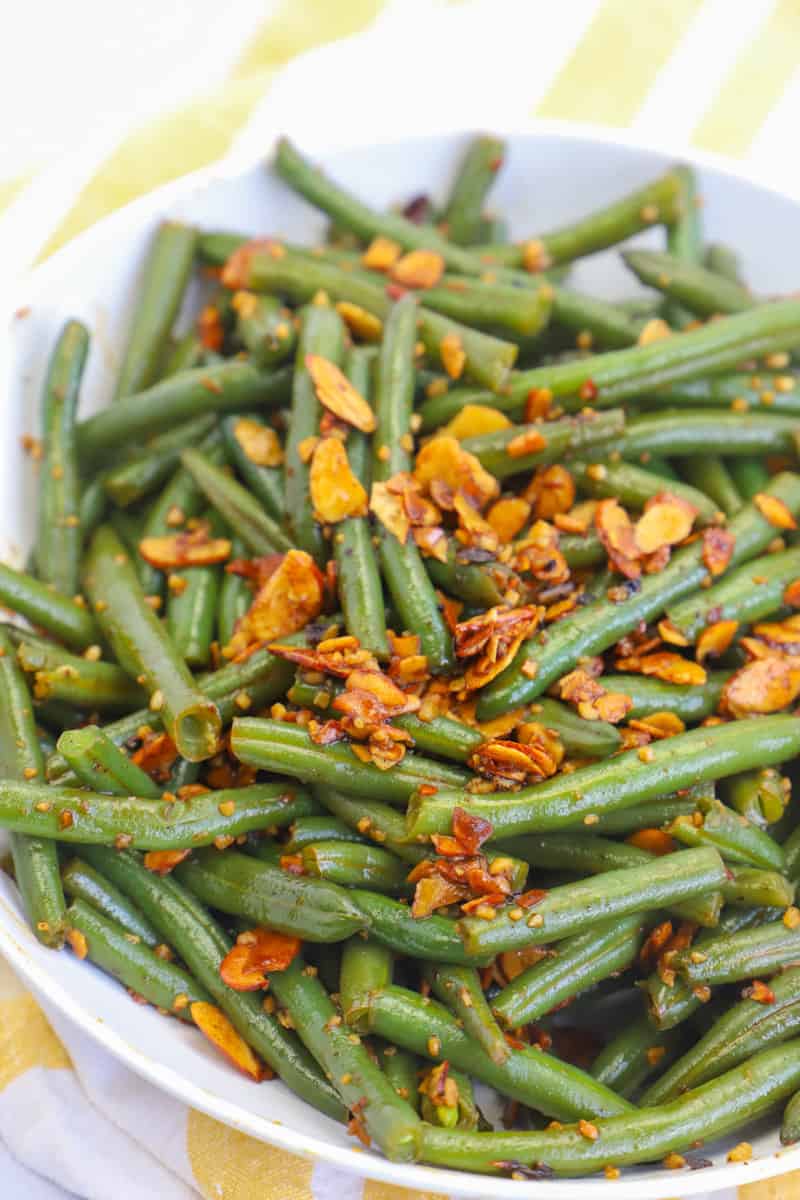 The BEST Green Bean Recipe in white serving dish