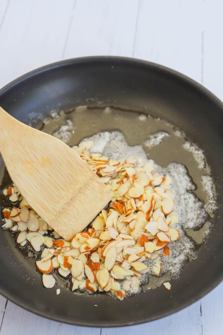toasting almonds in butter on skillet