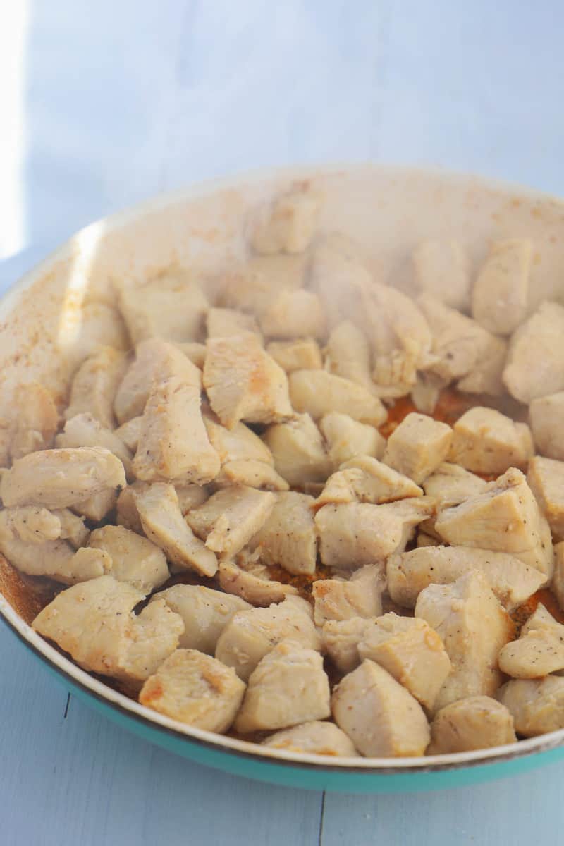 cooking chicken on skillet