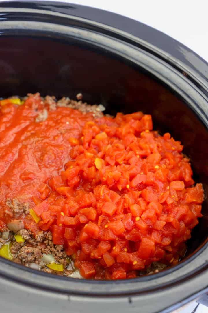 slow cooker spaghetti sauce ingredients in a slow cooker