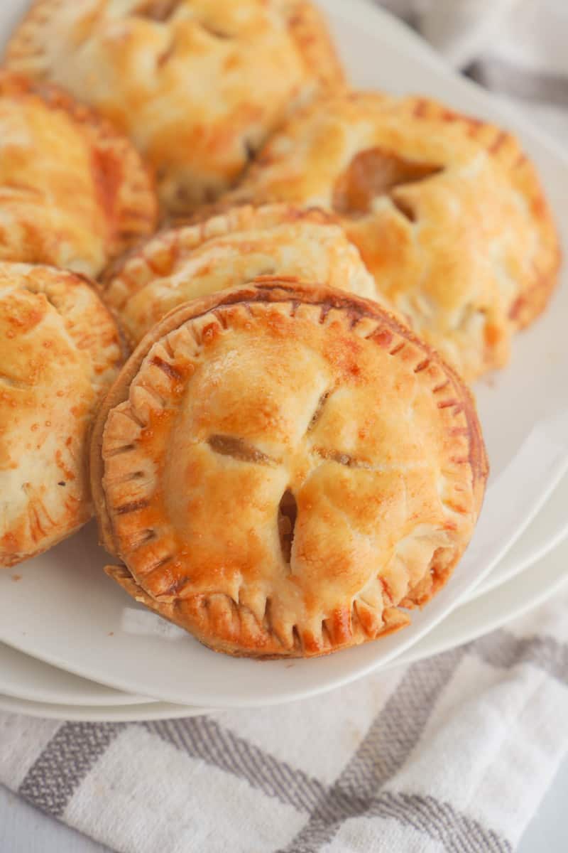 apple pie cookies on white plate close up