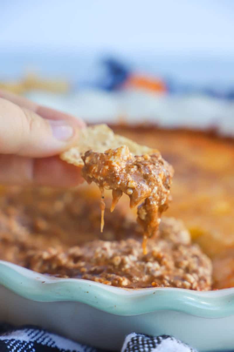 Cincinnati chili dip on a tortilla chip