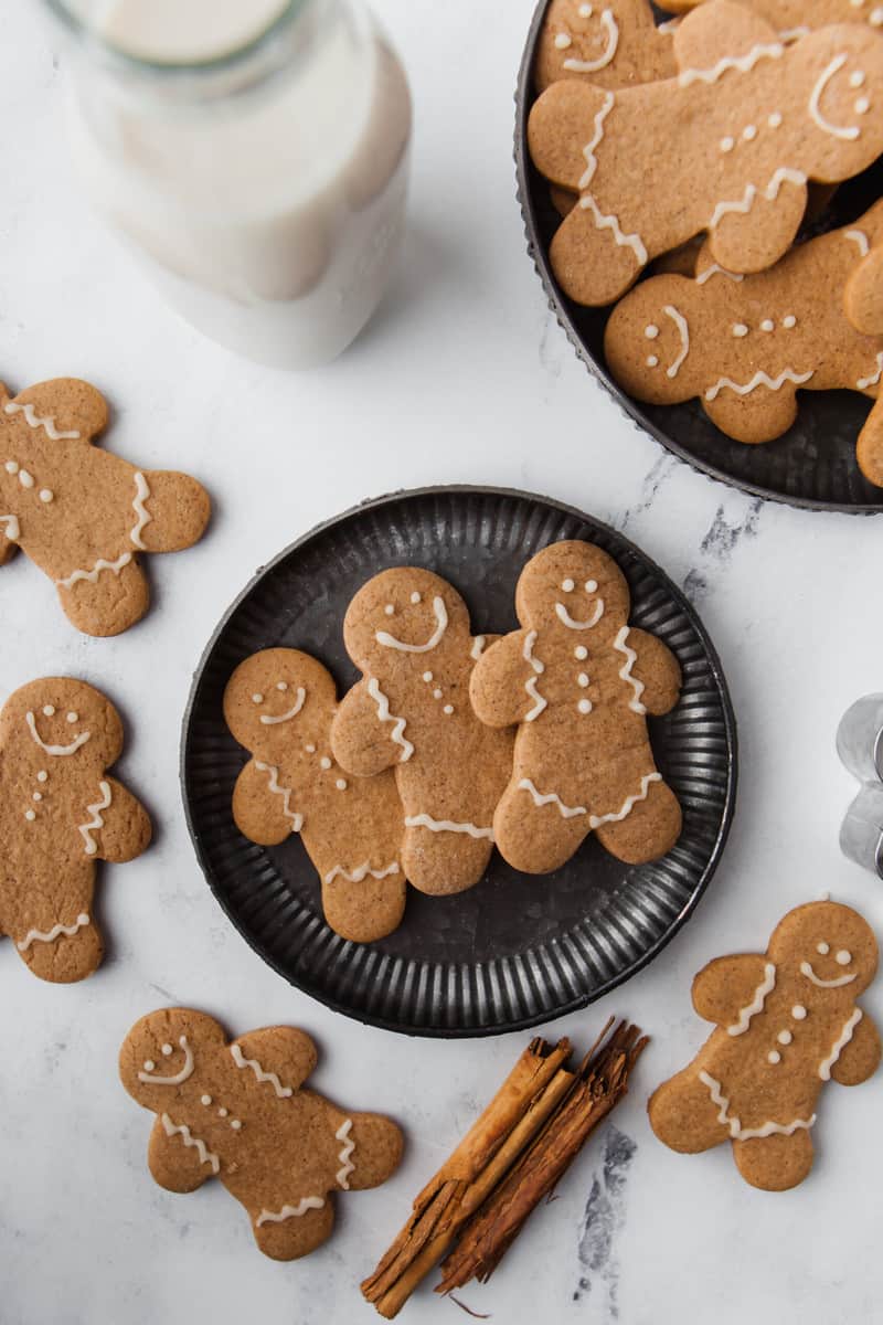 Gingerbread Cookies on black plate and on counter