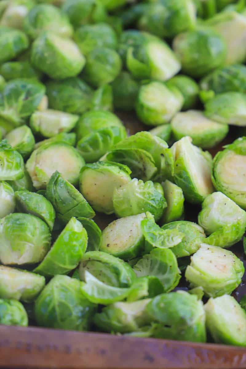 Brussel Sprouts seasoned on baking sheet