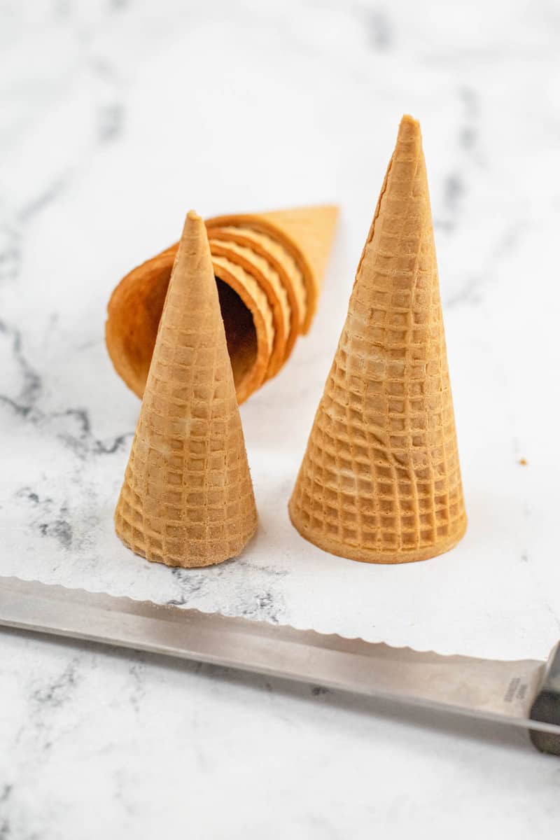 preparing the ice cream cones for the hats