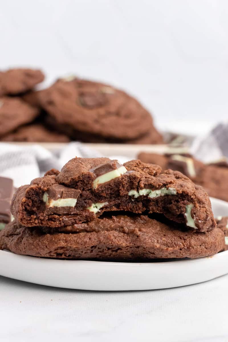 Mint Chocolate Andes Cookies on white plate with bite taken out of one