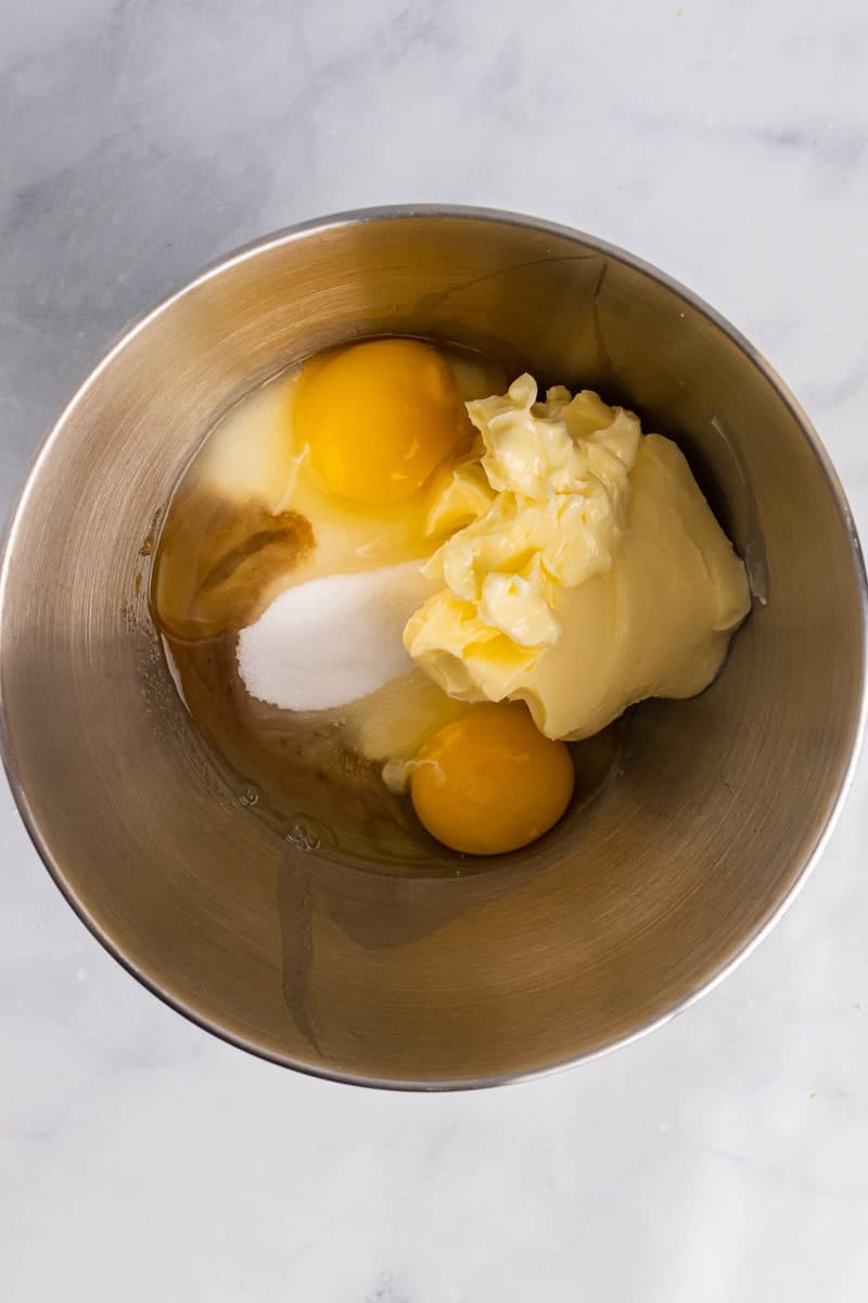 mixing eggs sugar and butter together for cookies