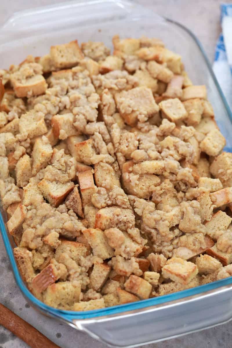 adding the topping to the casserole