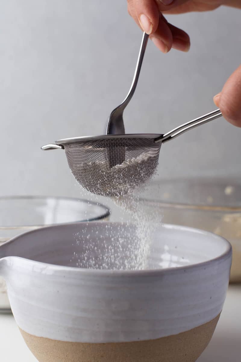 sifting the flour for the cupcakes