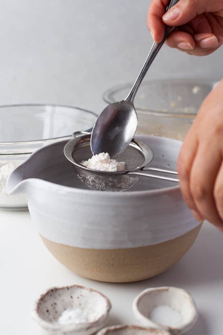 sifting the dry ingredients together