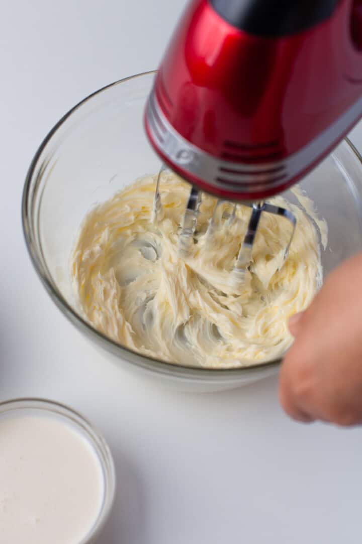 mixing together the eggs and sugar for the cupcakes