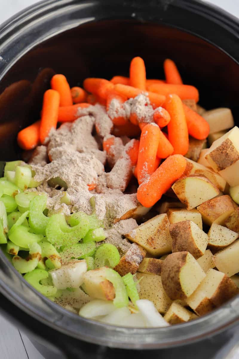 adding all ingredients to the slow cooker