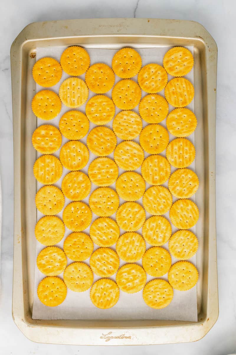 Ritz crackers on baking sheet