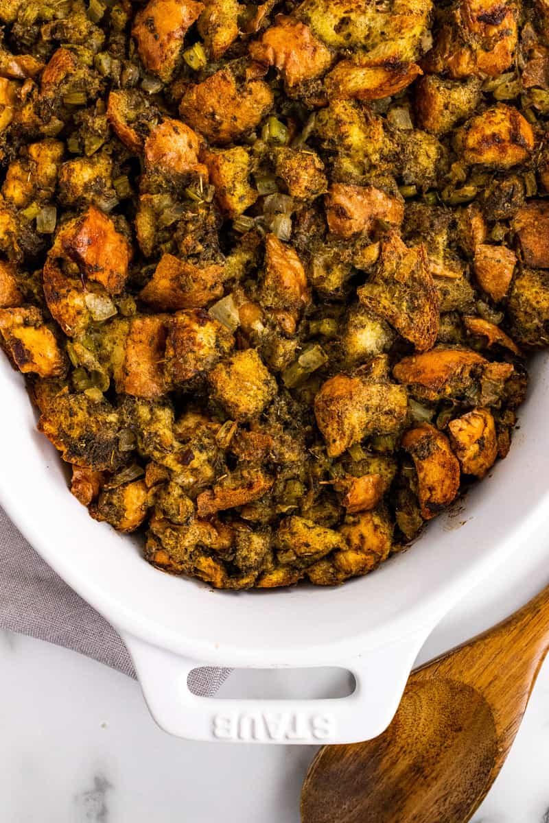 closeup of stuffing in white casserole dish