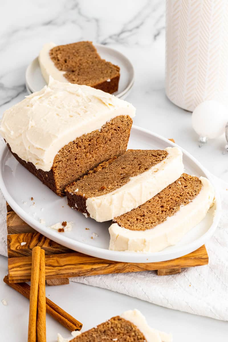 gingerbread loaf sliced on white plate