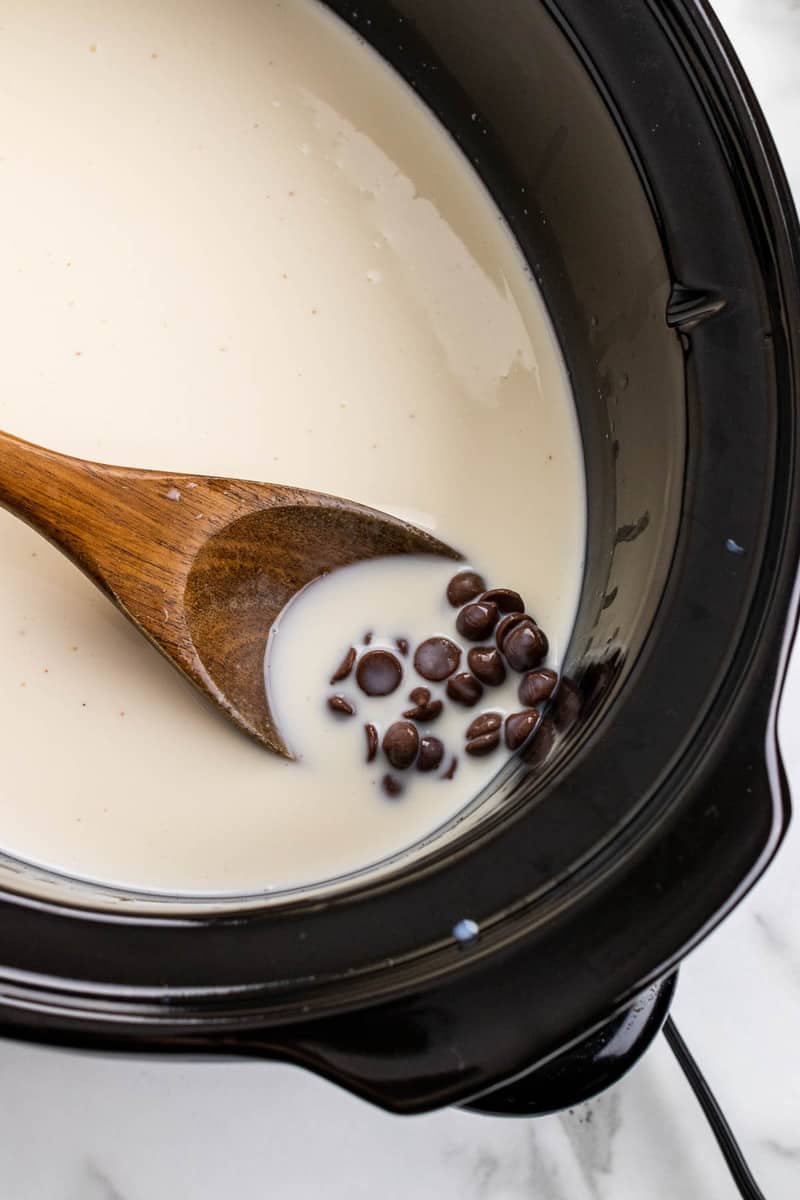 putting ingredients in the slow cooker