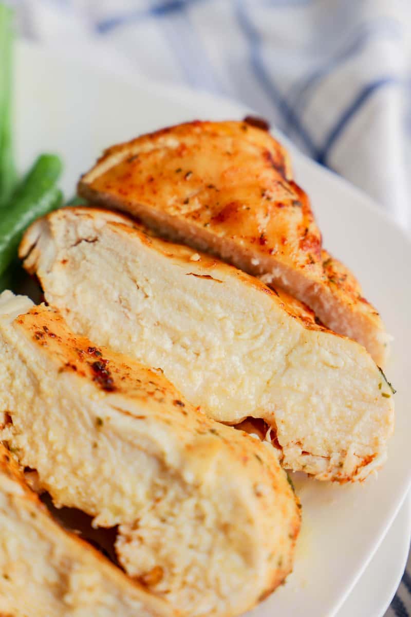 Air Fryer Chicken sliced on a white plate