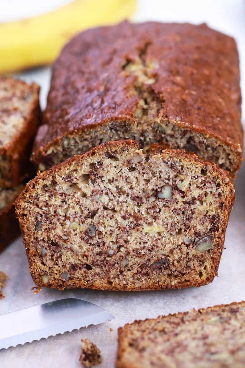 Banana Nut Bread sliced on cutting board