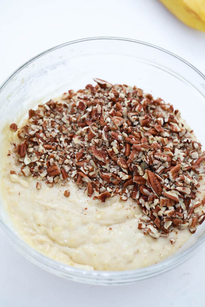 adding pecans to the batter