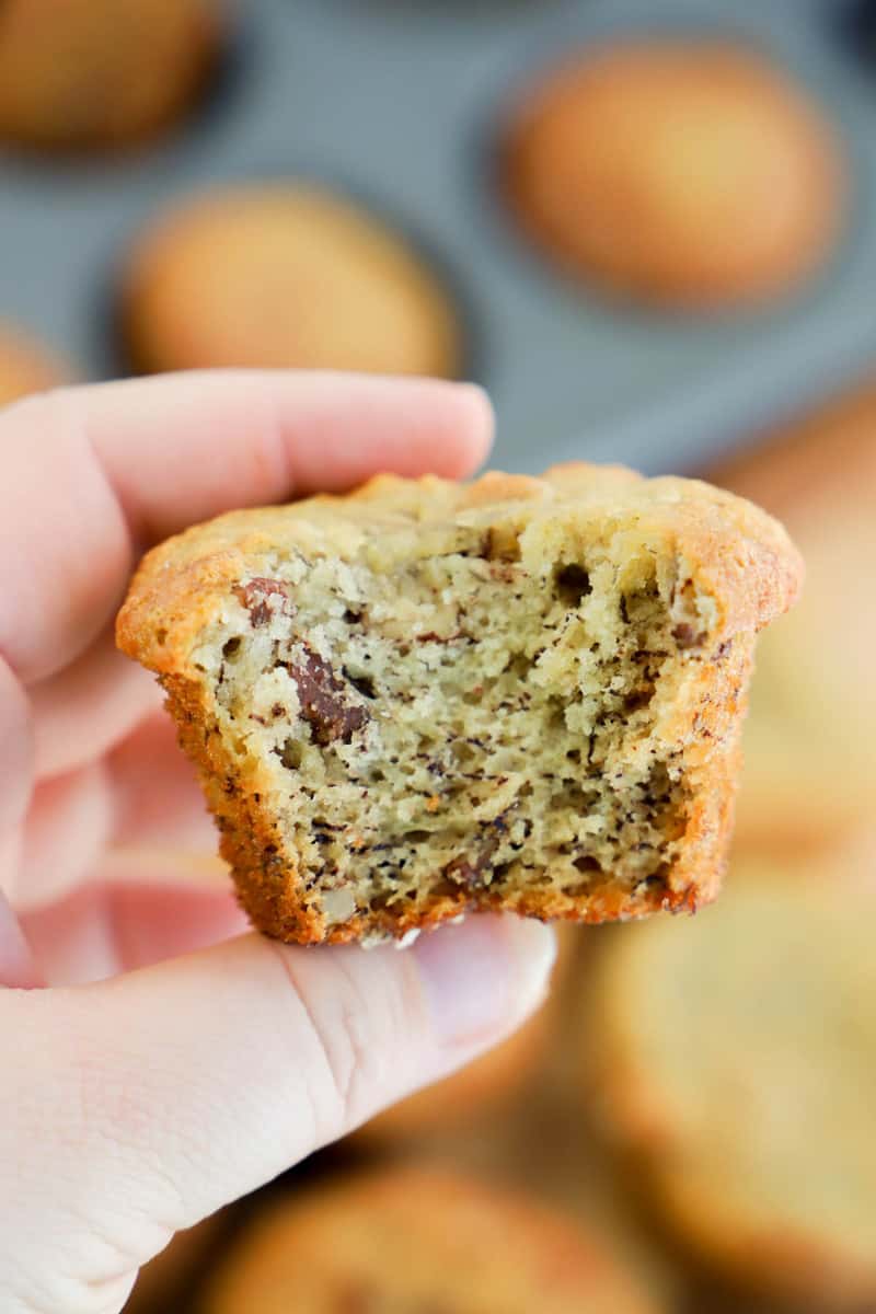 banana nut muffin closeup with bite taken out of it