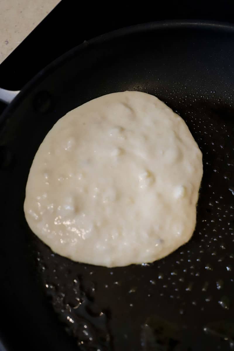 cooking pancake on skillet