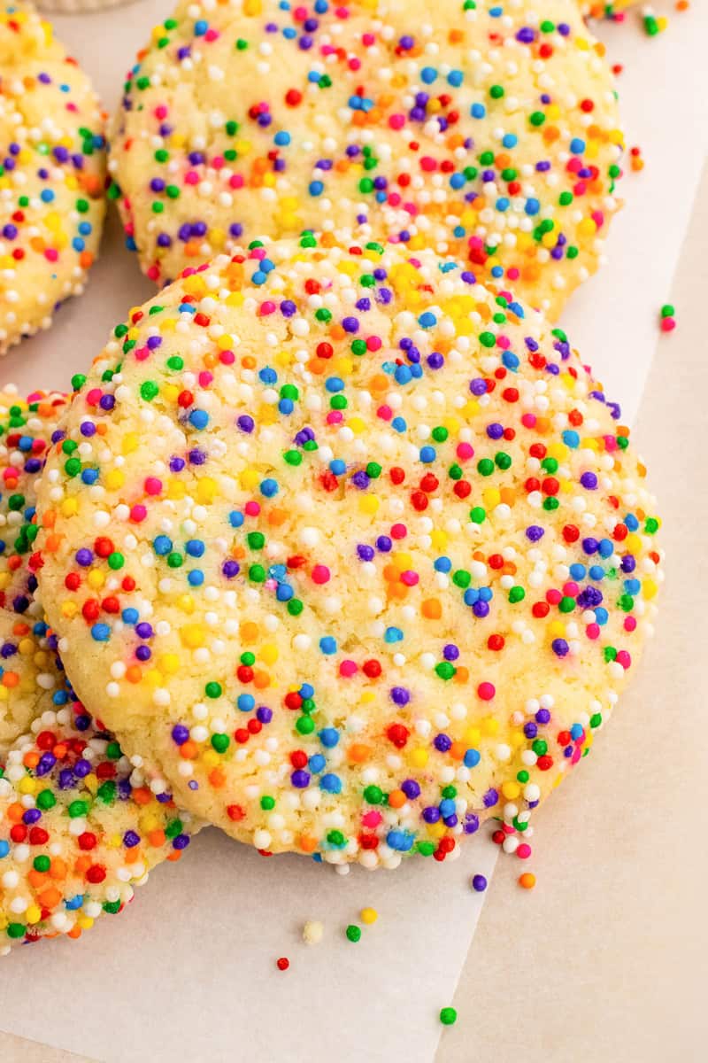 closeup of sprinkle cookie on parchment paper