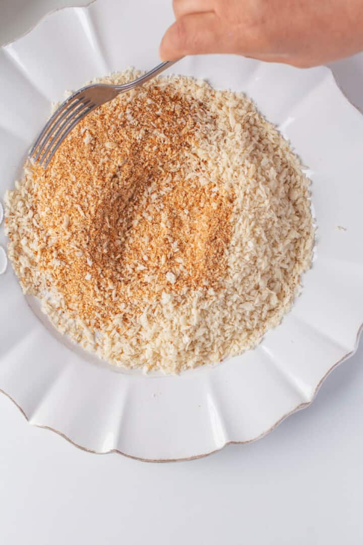 mixing together the panko and breadcrumbs