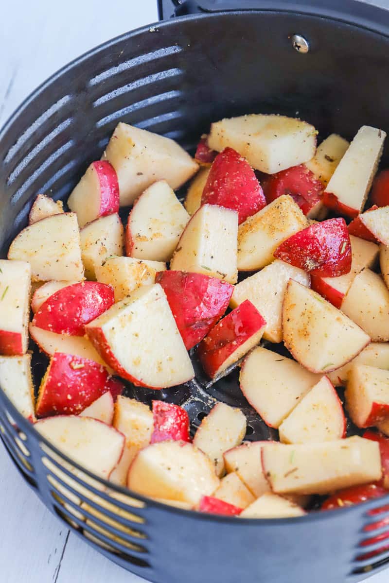 red potatoes in the air fryer basket