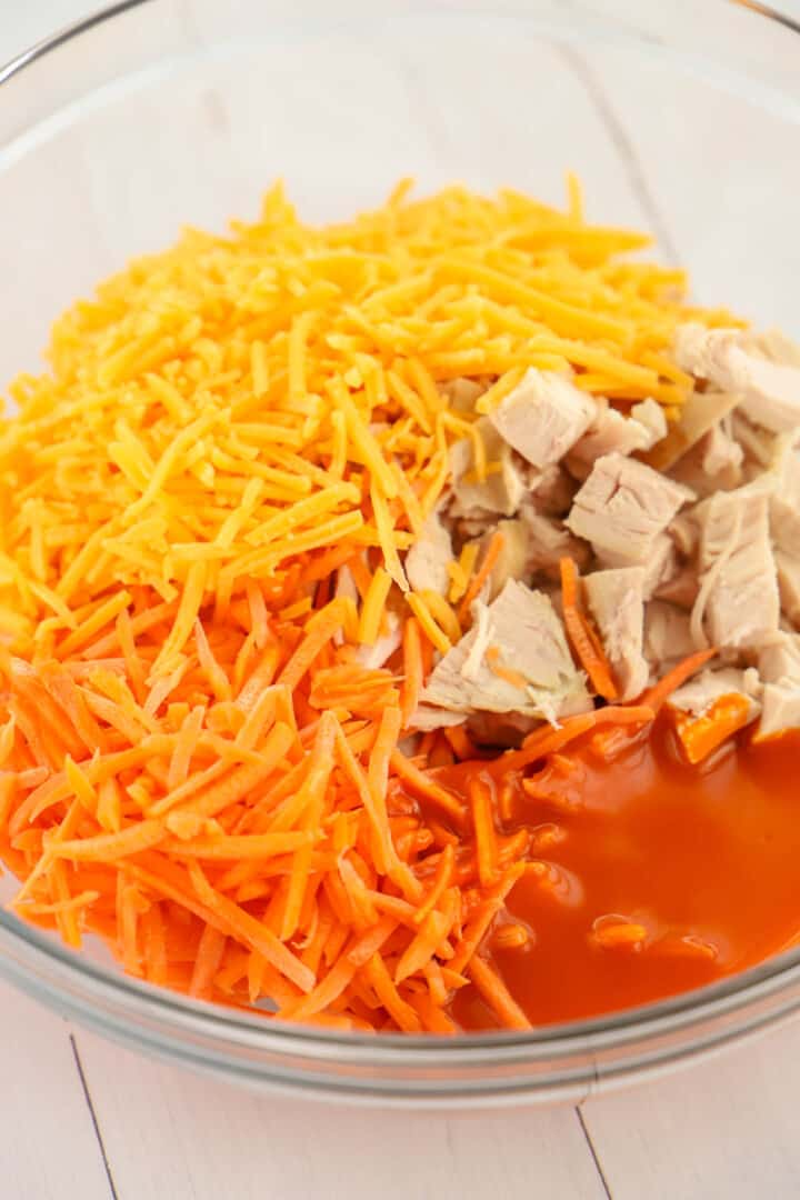 ingredients for Buffalo chicken wraps in mixing bowling