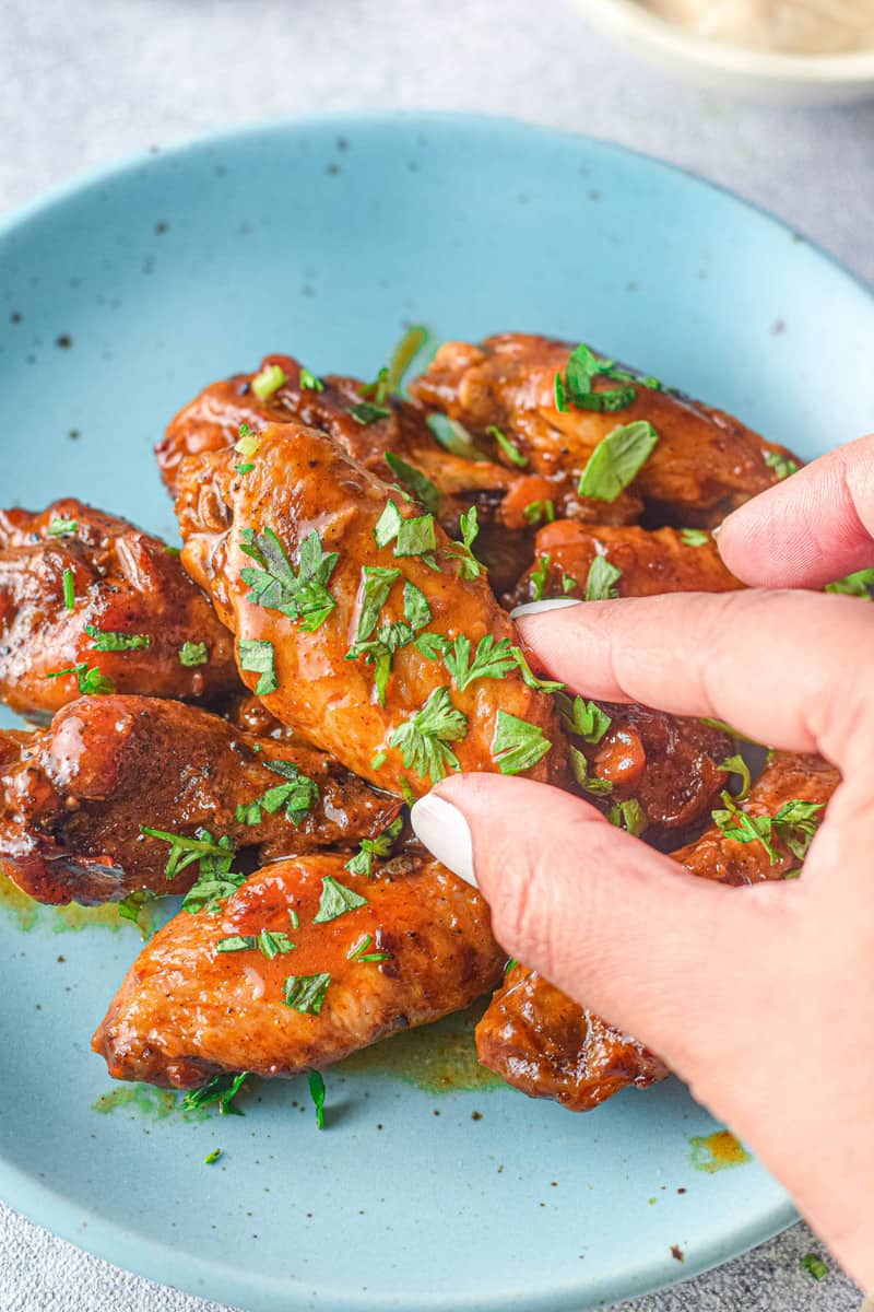 Instant Pot Chicken Wings served on a blue plate