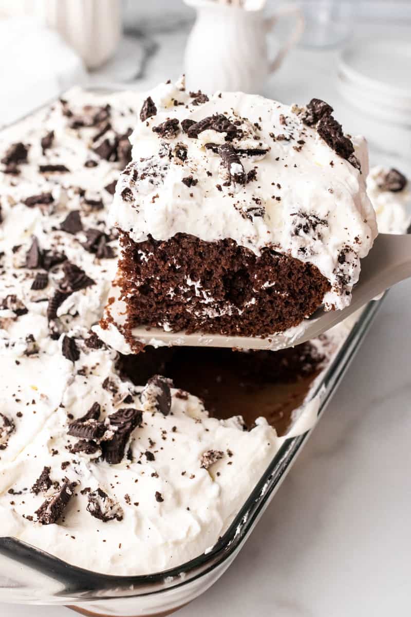 closeup of a slice of the Oreo Poke Cake