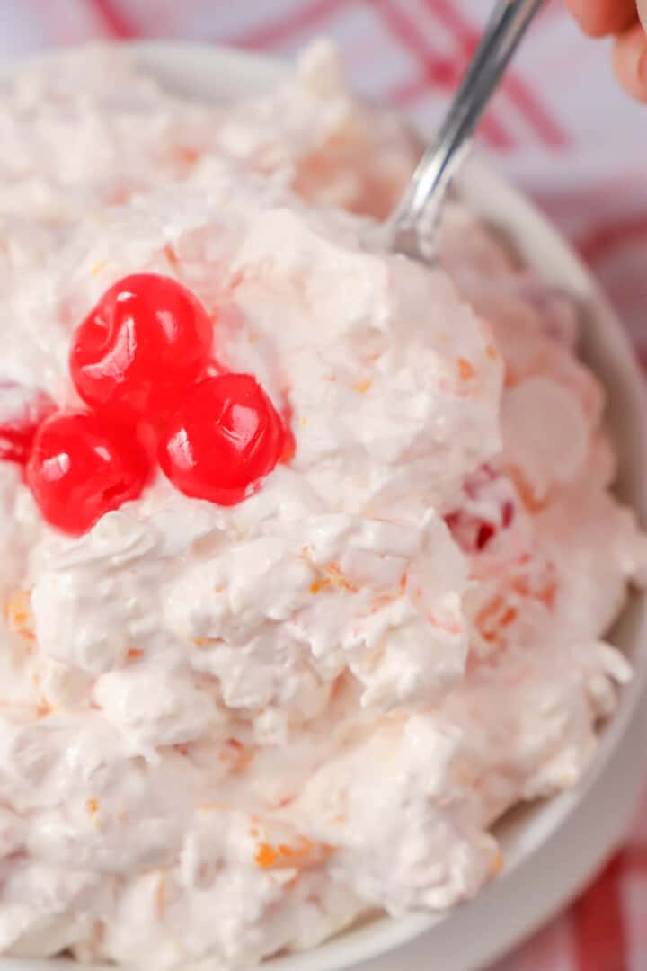 closeup of ambrosia with cherries on top