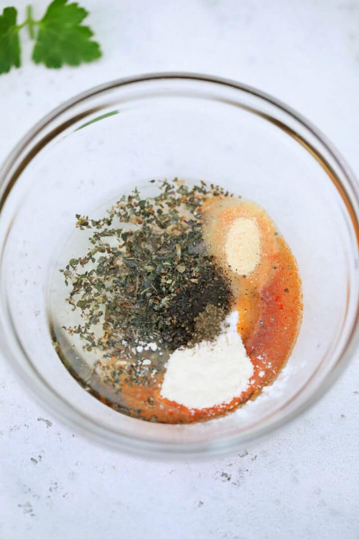 the seasoning and oils in a clear bowl